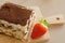 Tiramisu. Traditional italian dessert on wooden plate