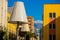 TIRANA, ALBANIA: Huge lanterns in the form of a lamp. Colorful apartment buildings in Tirana.