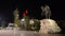 Tirana city centre, Skanderbeg square by night. Skanderbeg statue, Et`hem Bay Mosque, clock tower and Albanian flag in Tirane. She