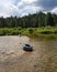 Tire on the edge of Creek