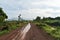 Tire track of many vehicle on soil mud road in countryside in rainy season