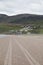 Tire tracks on Inch Beach on Dingle Peninsula, County Kerry