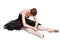 Tired ballerina in black on isolated background