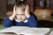 Tired, bored, frustrated and overwhelmed italian first-grader on