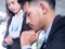 Tired businessman at desk with laptop searching way out from difficult situation. Thoughtful stressed frustrated man working for