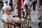 Tired Chinese man resting on a chair