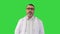 Tired depressed old male doctor on a Green Screen, Chroma Key.