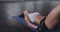 Tired and exhausted sportswoman resting on gym floor