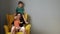 tired exhausted young mother sitting disturb in chair with two naughty children