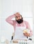 tired handsome man with beard and moustache cooking food. professional restaurant cook baking. skilled baker use kitchen