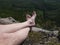 Tired hikers legs without shoes. Man hiker legs