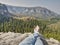 Tired hikers legs without shoes. Traveler relaxing