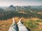 Tired hikers legs without shoes. Traveler relaxing