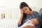 Tired Mother Suffering From Post Natal Depression