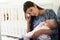 Tired Mother Suffering From Post Natal Depression