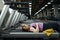 Tired overweight woman lying on treadmill in gym