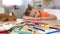 Tired preschooler sleeping at desk, boring class, elementary school education