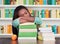 Tired University Student Sleeping On Books In Library