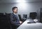 Tired White-collar worker sitting in office in front of computer