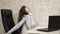 Tired woman office worker sleeping on the desk at work. business woman was weakened at work and fell asleep at the