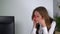 Tired woman work at office computer desk. Female officer at project deadline