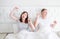 Tired yawn middle age couple in bed. Family life and healthy relationships. Health care and morning concept. Copy space