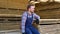 Tired young male worker in lumber warehouse