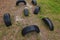 Tires buried in the ground to the obstacle course