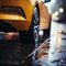 Tires in rain Close up view, car maneuvering on wet pavement