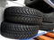 Tires shop. Tread blocks and sipes on new tires stock photo