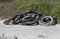 Tires washed up on a Gulf Coast beach