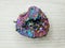 Titanium rainbow aura quartz semigem cluster