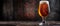 title. cold and refreshing glass of delicious craft beer on a wooden table,
