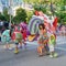 Tivat city, Montenegro. International Summer Carnival. Childrens parade. Participants of Carnival in costumes of fishes