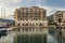 Tivat, Montenegro, 07/26/2016: Luxuri hotel in a marina with snow-white yachts. Front view