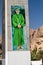 TIWI, OMAN - MARCH 4, 2017: Portrait of Sultan Qaboos on a pillar of a highway bridge over Wadi Tiwi, Om