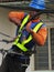 TM Employee Stripping Cable Insulation Atop The Telephone Pole