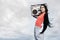 To dance is my passion. Cropped portrait of an attractive young female dancer standing with her boombox against a stormy