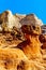 Toadstool Hoodoos against the background of the colorful sandstone mountains in Grand Staircase-Escalante Monument
