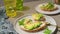 Toast with avocado cream cheese and wheat bread