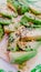Toast with avocado slices served on dry crispy bread. healthy food concept. Vertical mobile photo
