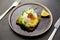 Toast bread with sliced avocado and pouched egg