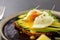 Toast bread with sliced avocado and pouched egg