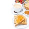 Toast with orange jam, cup of cappuccino and fresh berries