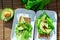 Toast to the avocado. Healthy avocado toast. Top view of the table. Healthy food, vegetarian food concept