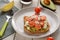 Toast with tomato, ricotta and avocado. Good-looking snack