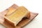 Toasted butter bread on wooden plate
