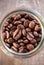 Toasted coffee beans in a glass jar