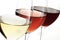 Toasting gesture red and white wine with splash, cheers close up with wine isolated