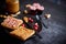 Toasts bread with homemade peanut butter served with fresh slices of cranberries